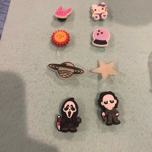 CROC Set of 8 croc gibbets. Horror movie, hello kitty in gently used condition